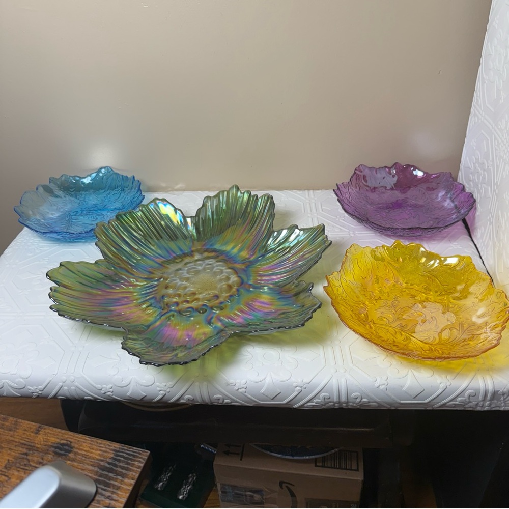 Bundle of iridescent glass dishes.